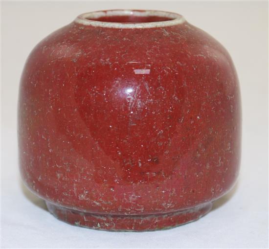 A Chinese sang-de-boeuf glaze water pot, 18th/19th century, height 7.5cm, faults